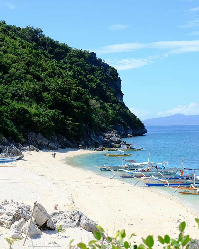 Boats Docked at Puerto Galera Beach